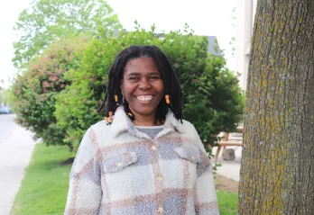 Gabrielle standing in an outdoor setting