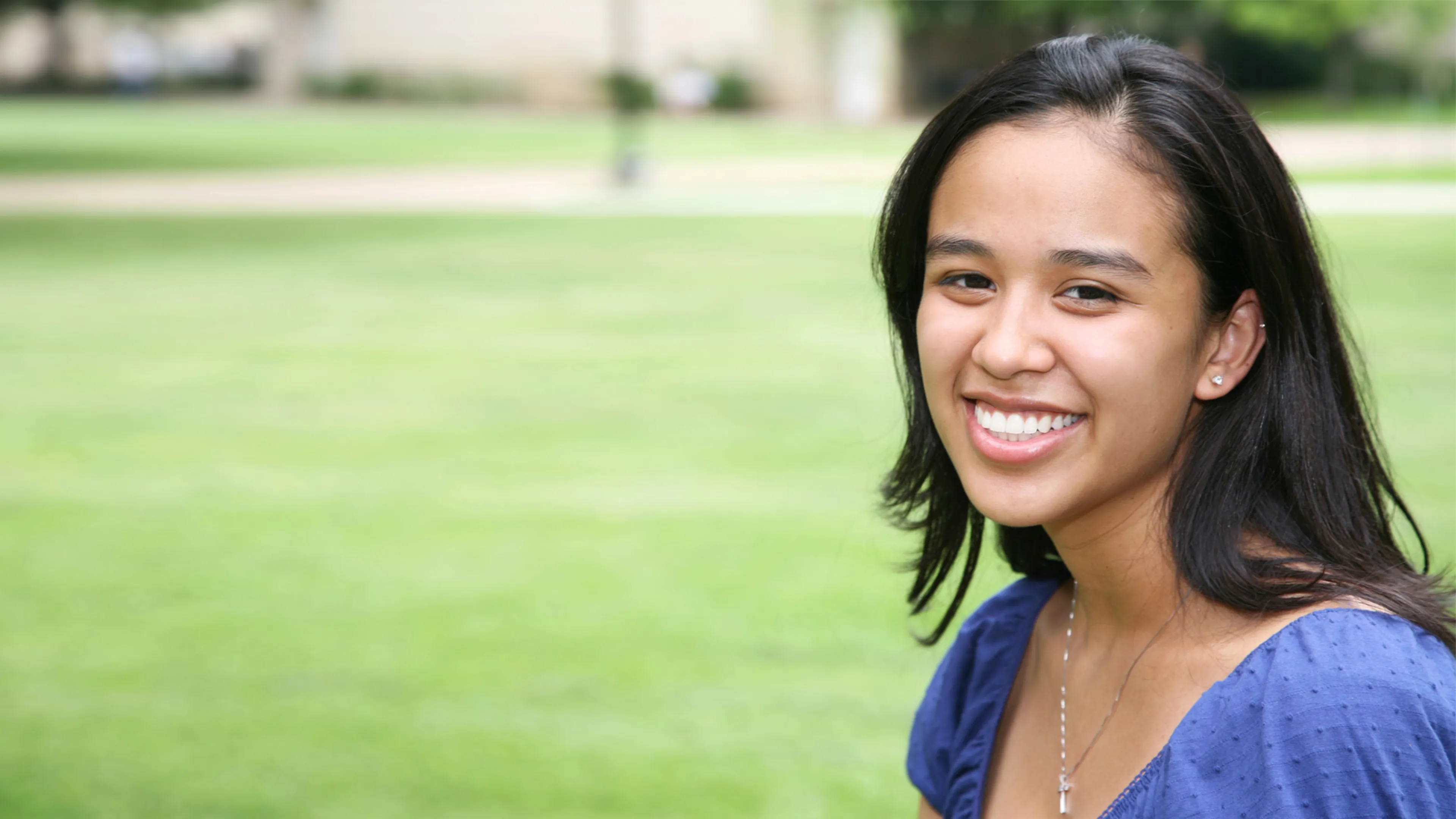 A smiling young woman.