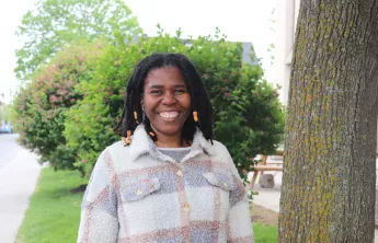 Gabrielle standing in an outdoor setting