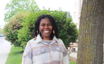 Gabrielle standing in an outdoor setting
